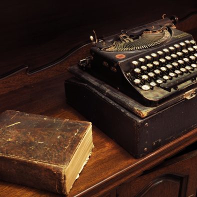 Old typewriter and book